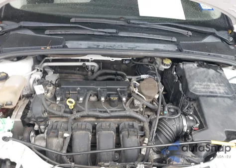 2015 Ford Focus Titanium z USA, uszkodzony, nr VIN 1FADP3J27FL230825